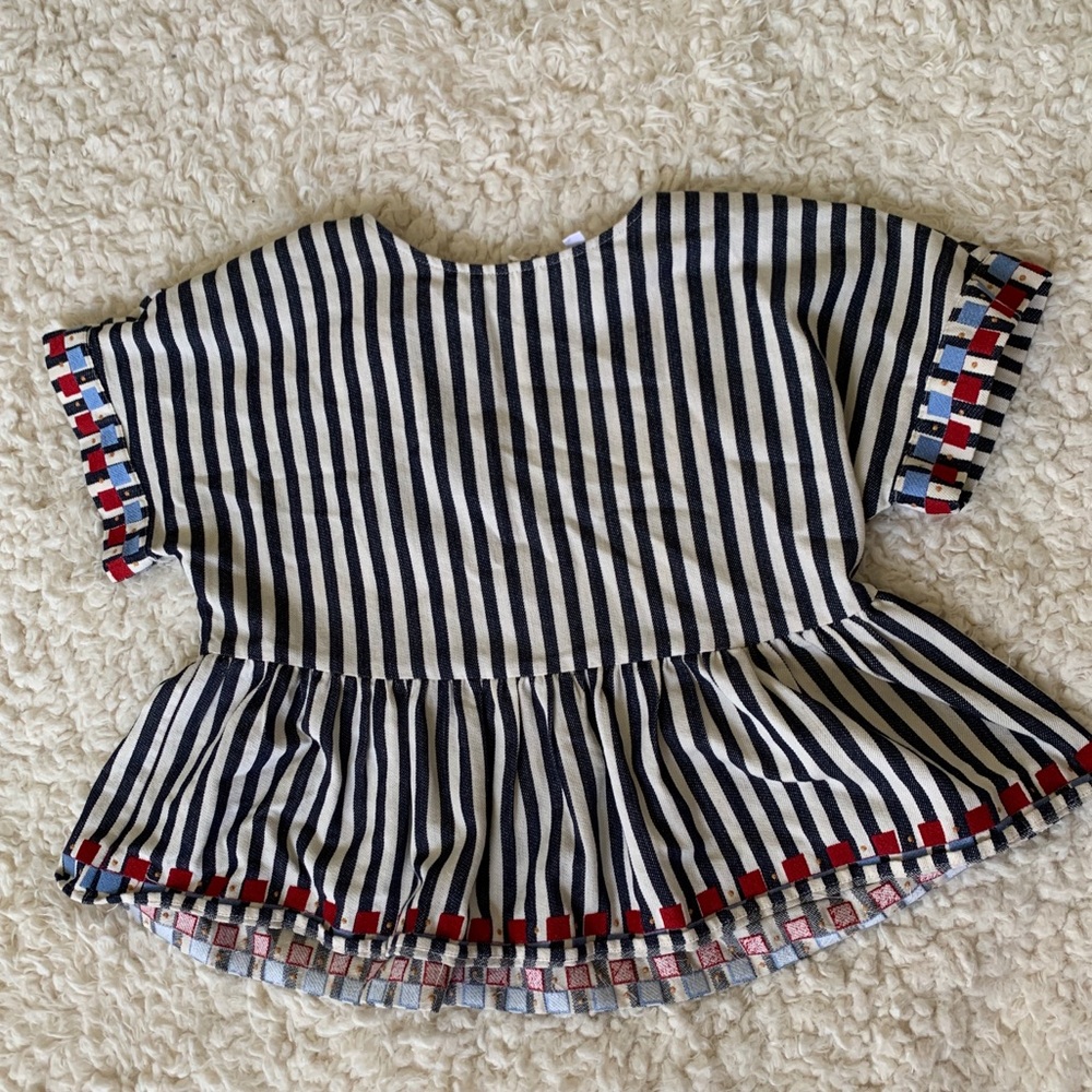 Embroidered peplum style summer top